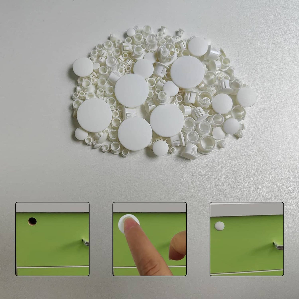 White plastic plugs, round flat-top caps and smaller inserts, scattered on surface