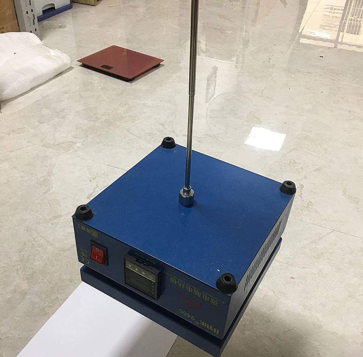 Blue magnetic pickup machine with upright telescoping pole
