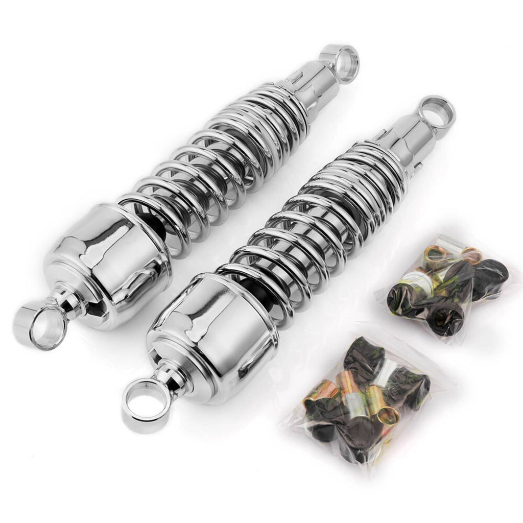 Chrome rear shock absorbers with coil springs, eyelet ends, and packaged mounting parts.