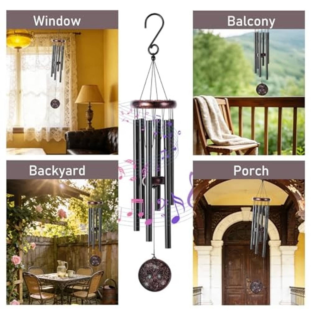 Wind chime with copper butterfly medallion and six black tubes, hanging on hook