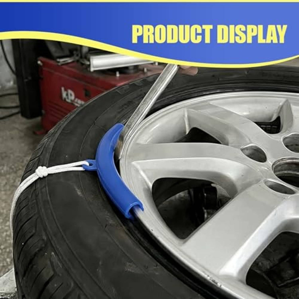 Blue rim protector guard attached to silver wheel rim over black tire