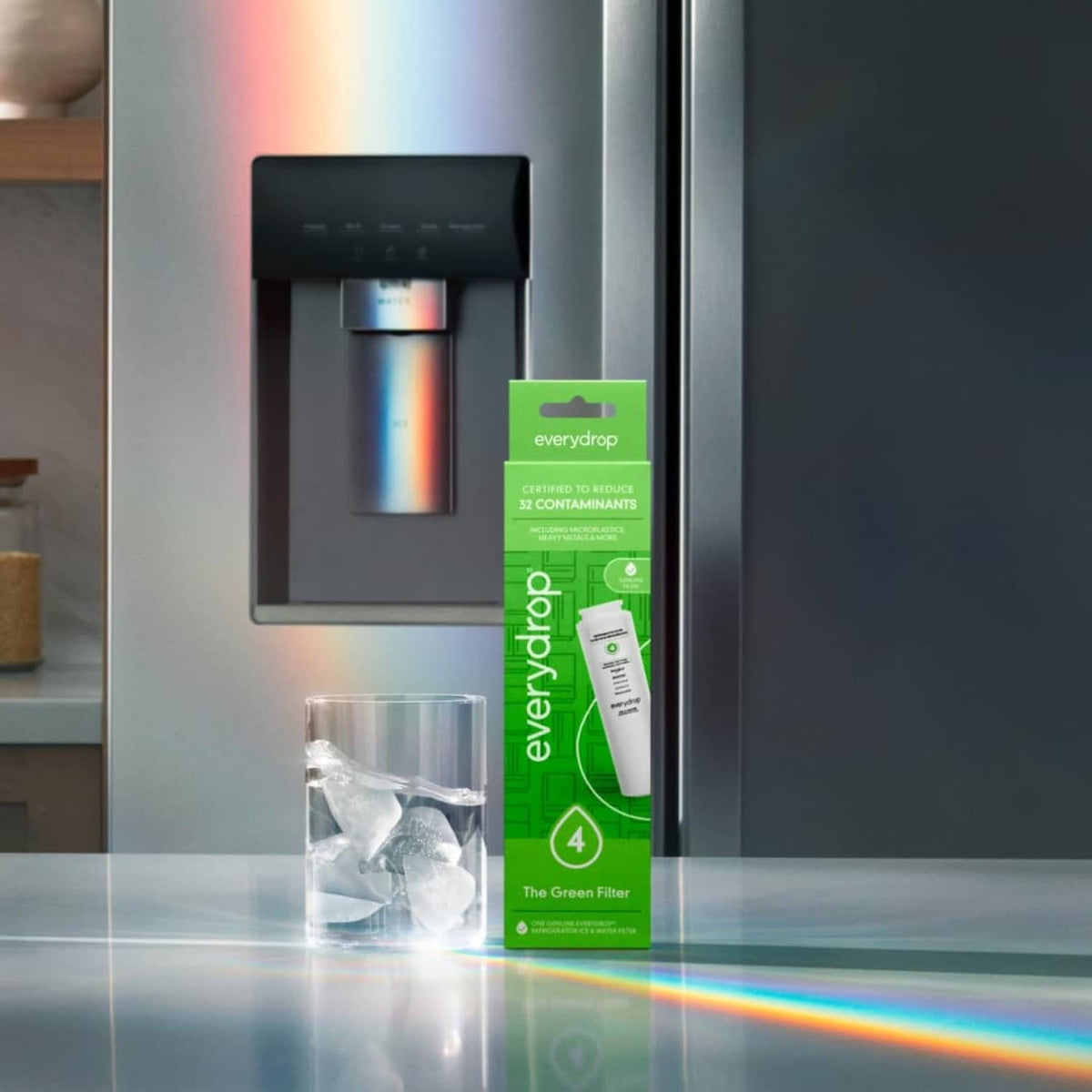 everydrop The Green Filter cartridge box in front of refrigerator water dispenser
