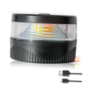 Black circular strobe beacon light with clear front lens and LED bar pattern