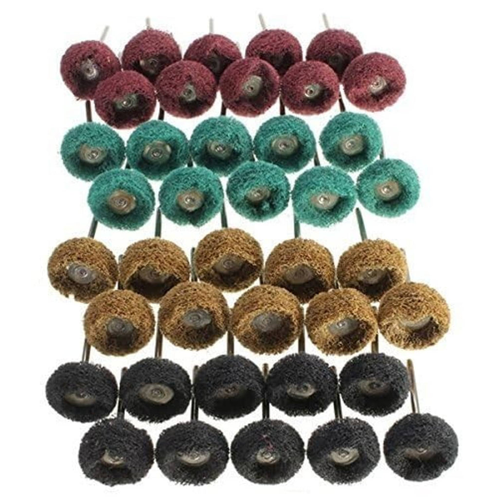 Set of circular abrasive polishing heads on pins in maroon, teal, brown, and black.