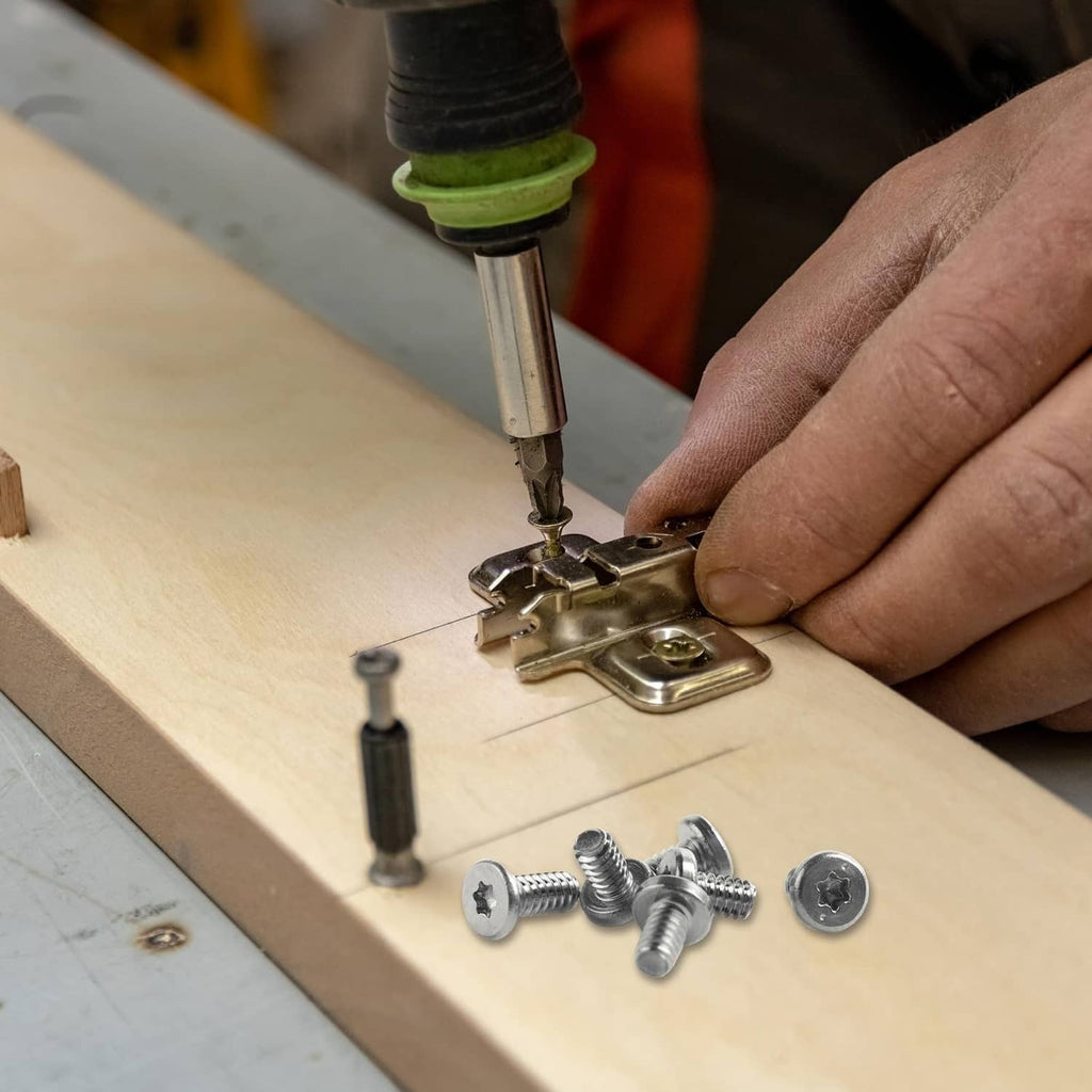 1/4-inch hex shank security Torx bit fastening screws into wood surface
