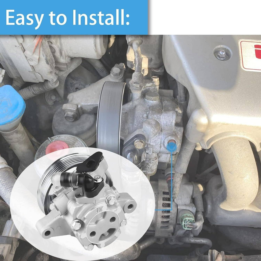 Power steering pump installed near engine components, showing silver pulley and black hose.