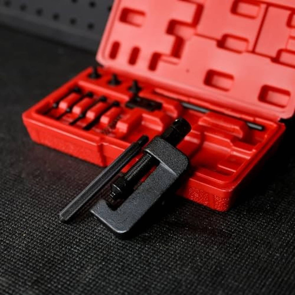 Chain breaker tool kit tool head with threaded rod, seated in red storage case