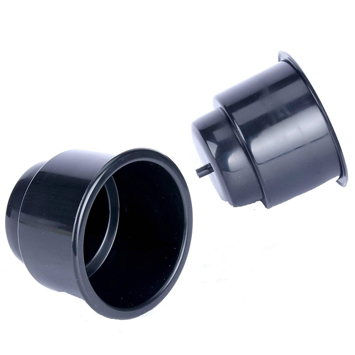 Pair of dark plastic recessed cup holders with rounded openings and side tabs