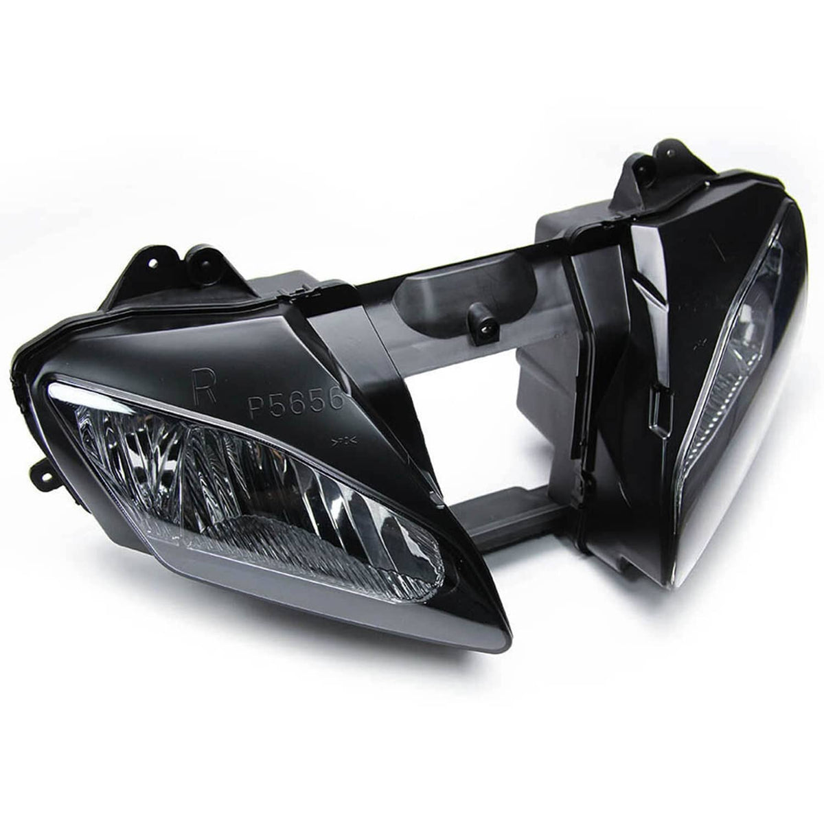Front headlight assembly with clear lens and black housing, straight-on view