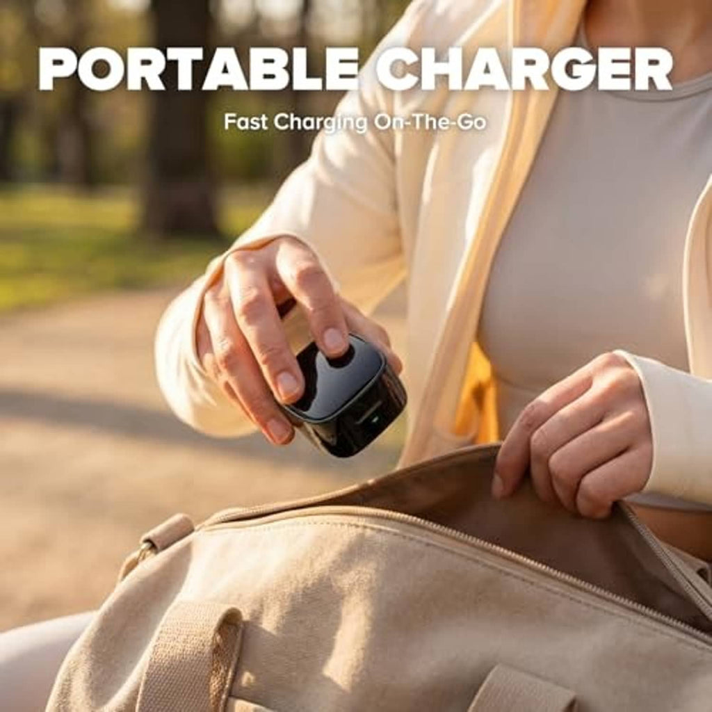 Black compact wireless charging case held in hand for on-the-go use