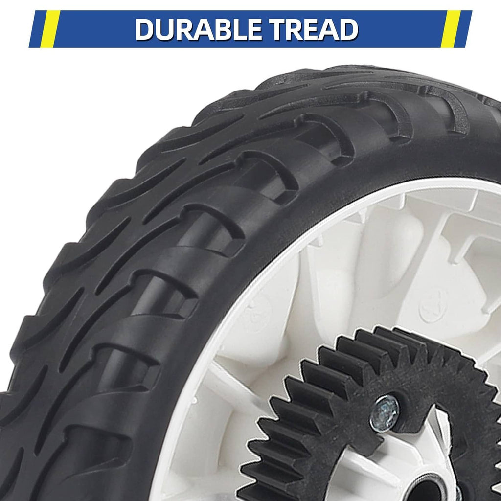 Rear wheel close-up with durable tire tread and black plastic gear hub