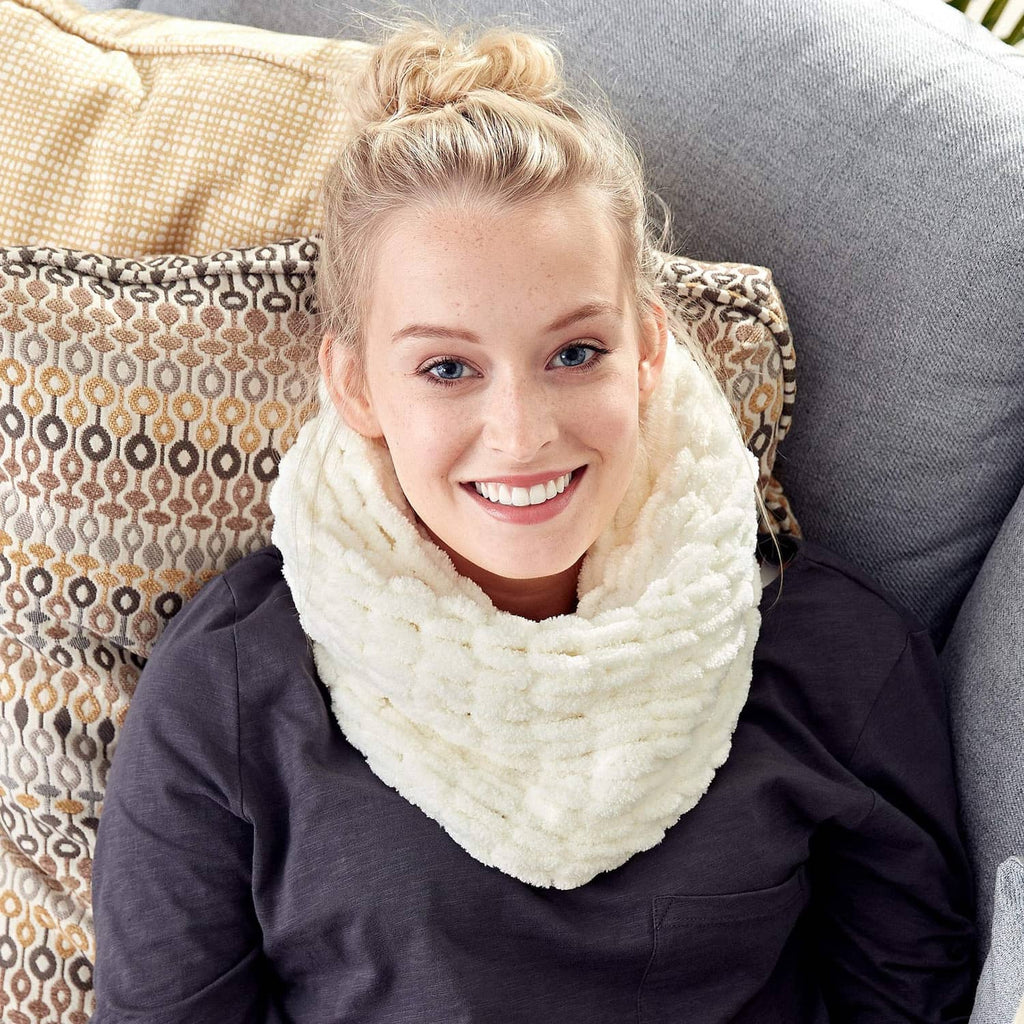 Cream chunky knit infinity scarf made from finger-loop yarn