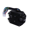 Voltage regulator rectifier module with black finned heatsink and multi-wire harness, white plug