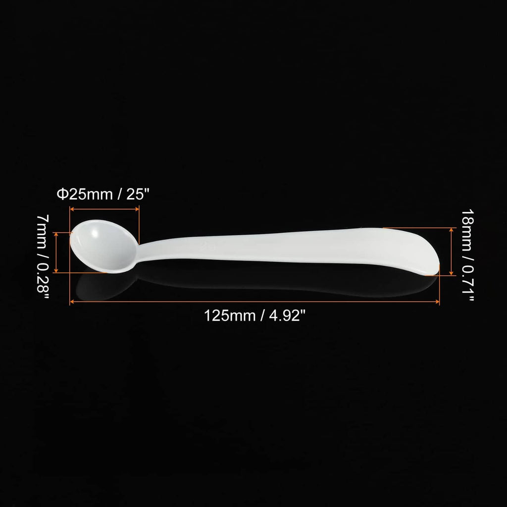 White plastic micro measuring spoon with round bowl and long handle