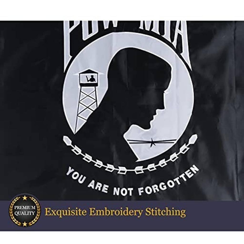 Close-up of POW/MIA embroidered emblem on black outdoor flag with stitched details