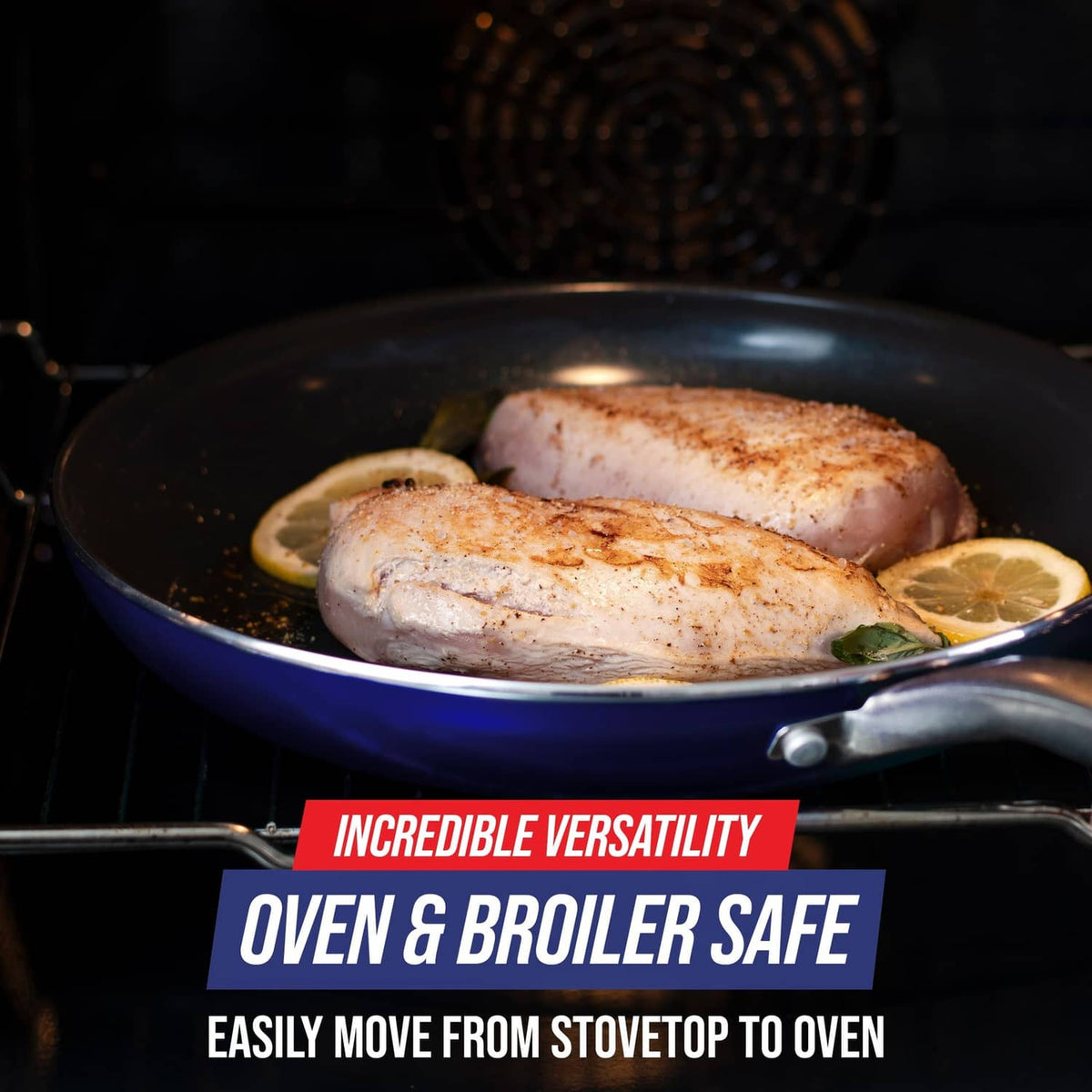 Blue nonstick frying pan skillet with browned chicken and lemon slices on stove