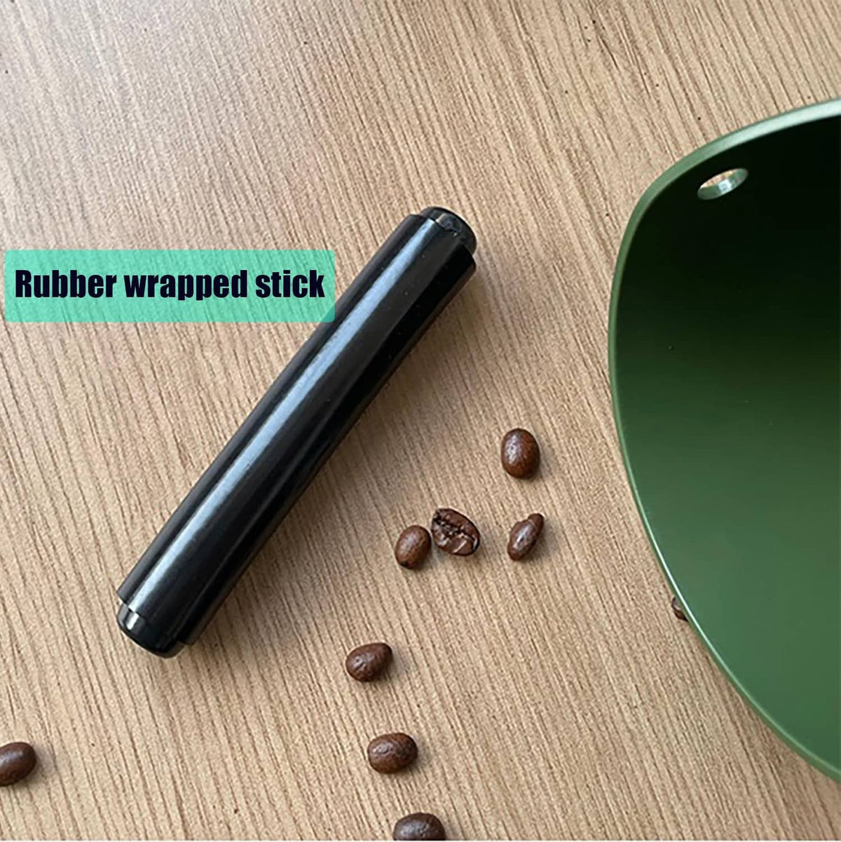 Black rubber-wrapped stick for knocking espresso grounds