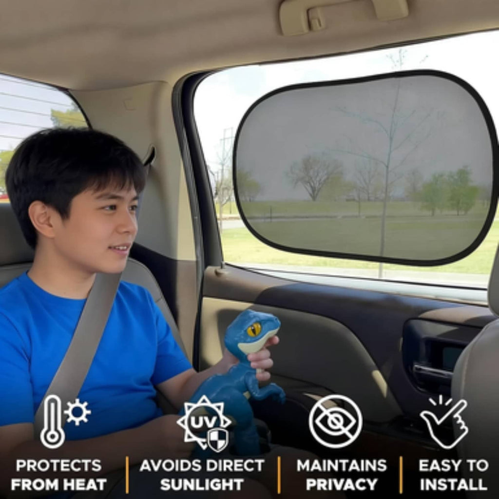 Black oval sun shade installed on a car window from inside the vehicle.