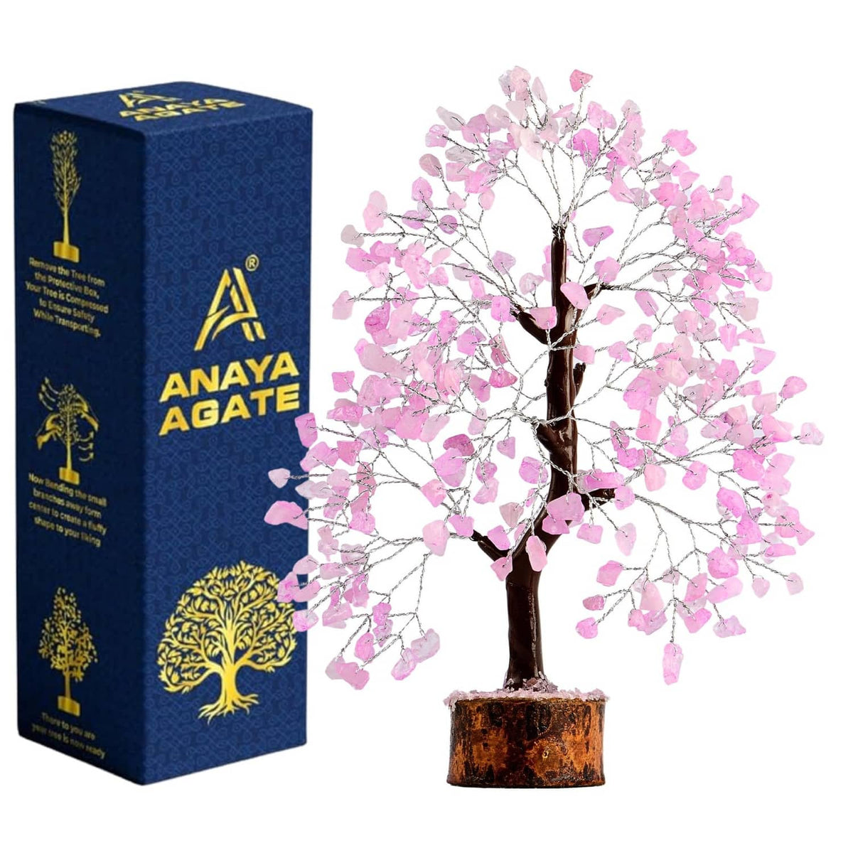 Rose quartz crystal tree with pink crystal leaves, shown beside retail gift box