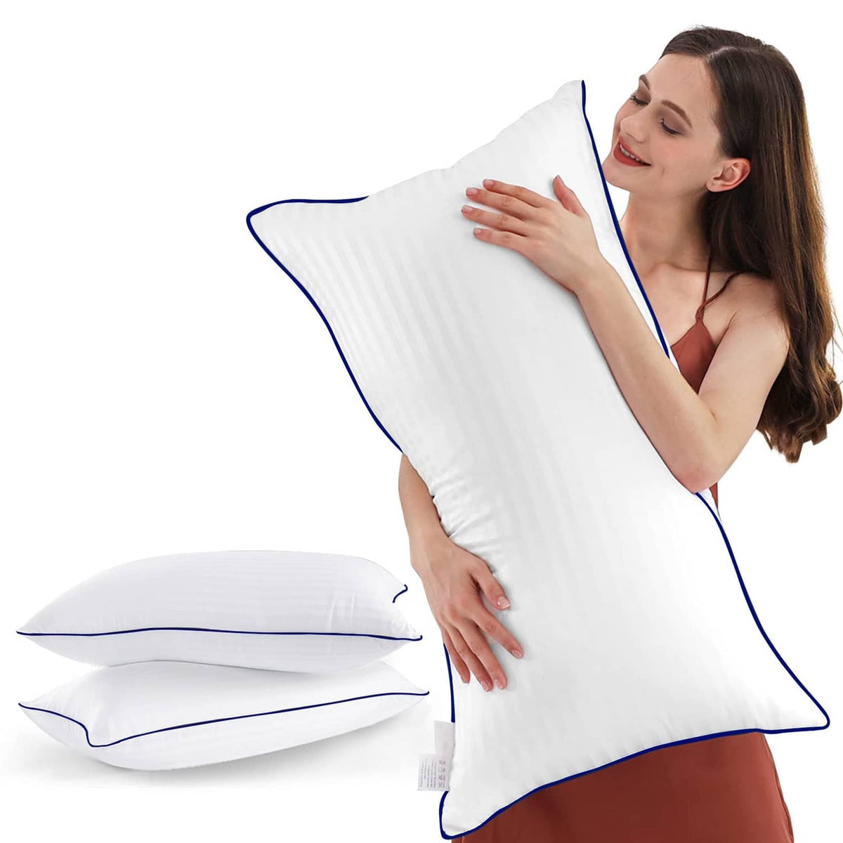 King-size white bed pillows with blue piping, shown upright and stacked