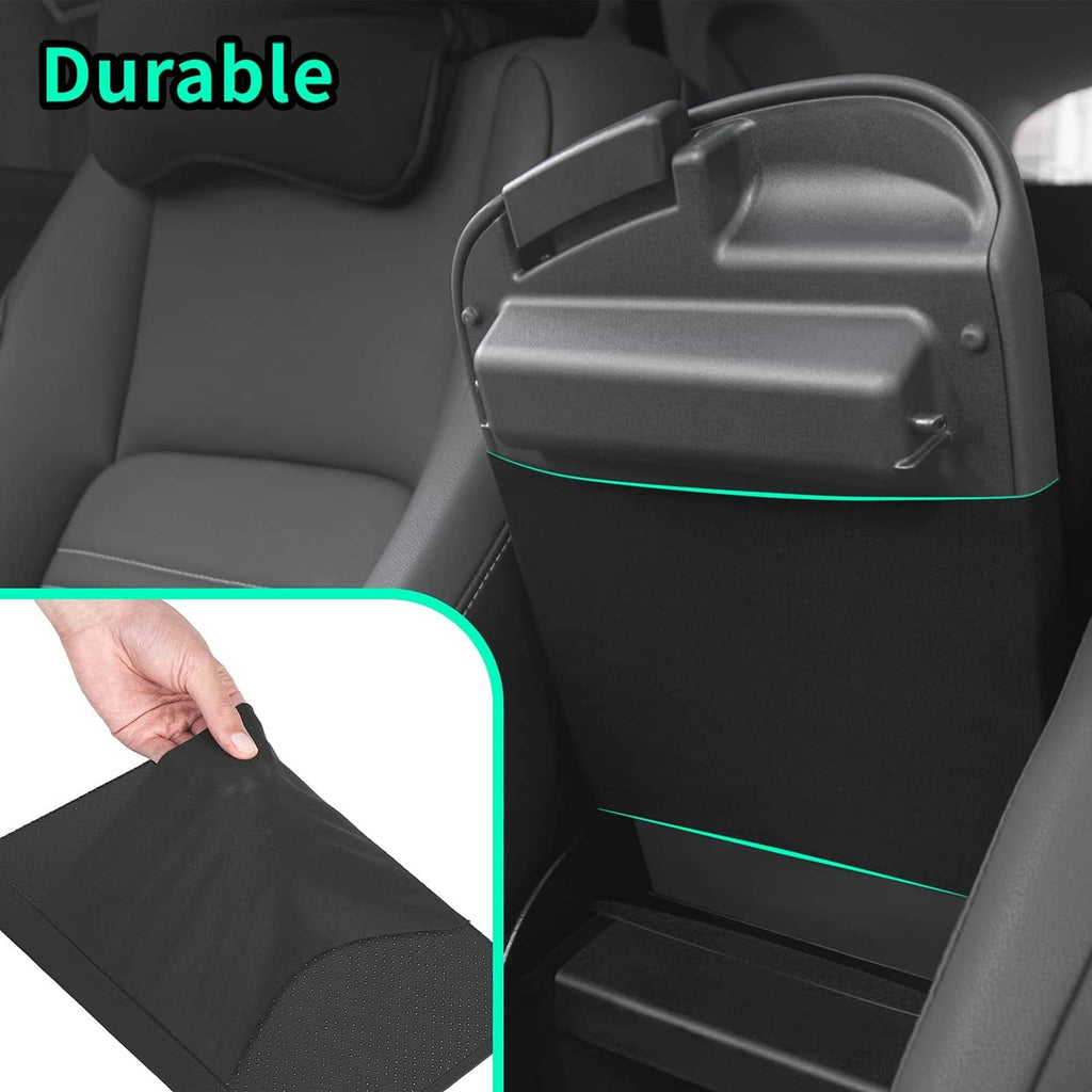 Black memory foam console cover pad installed in center console storage area
