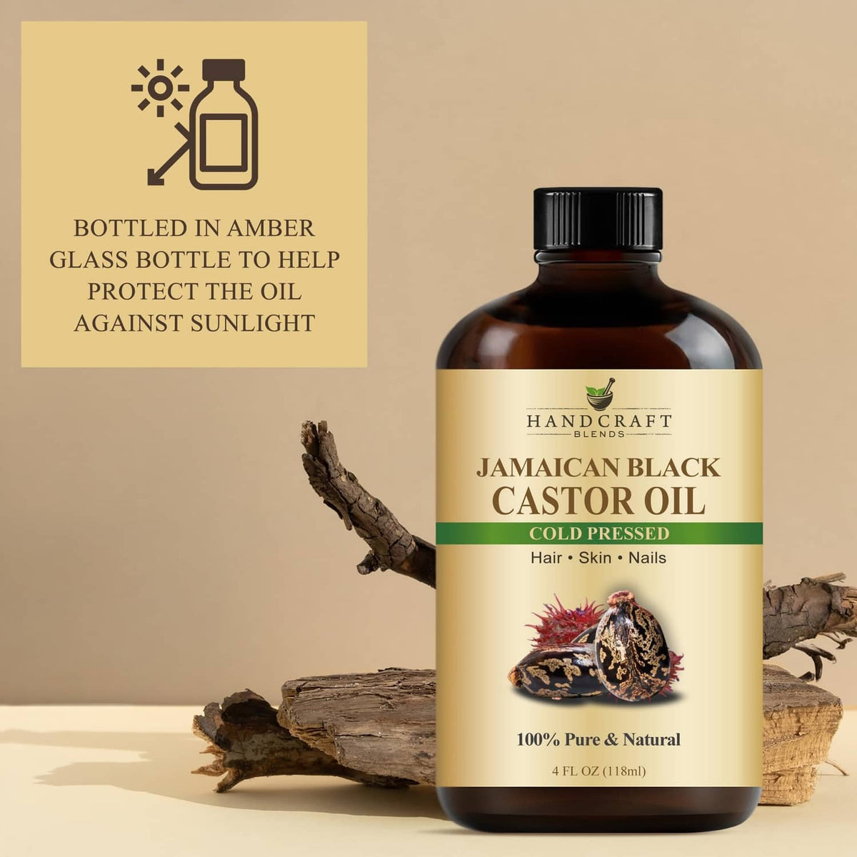 Cold-pressed Jamaican black castor oil bottle with amber glass protection label and wood pieces
