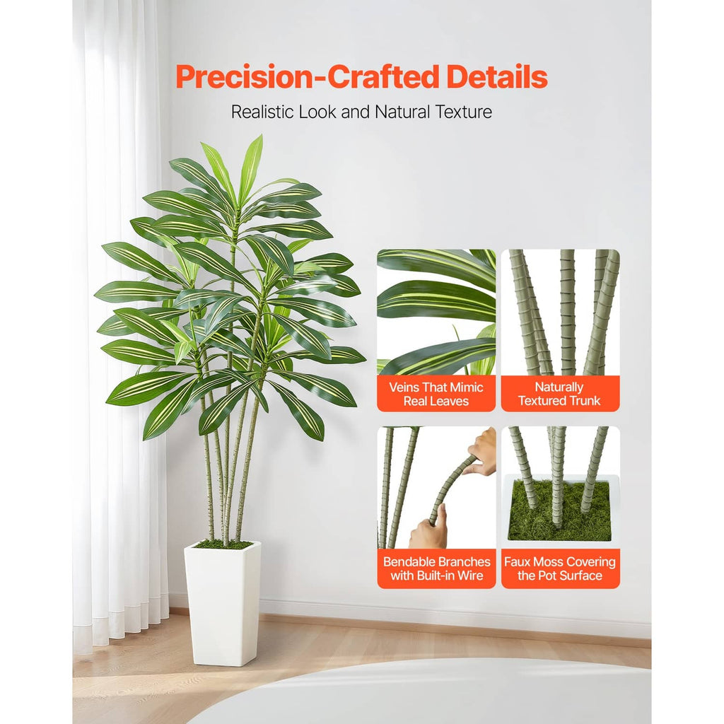 Faux dracaena plant with layered green leaves in a white pot for indoor decoration