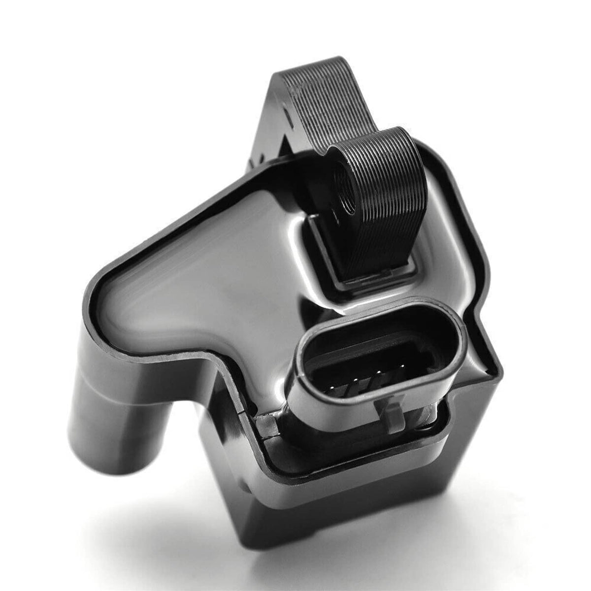 Ignition coil pack with black electrical socket and textured mounting strap