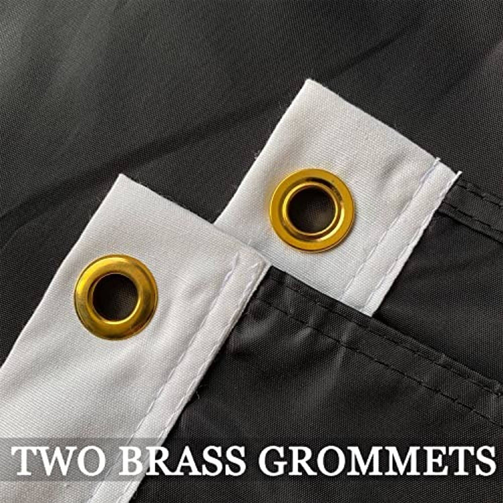 Black POW/MIA flag fabric with two brass grommets on white reinforced header
