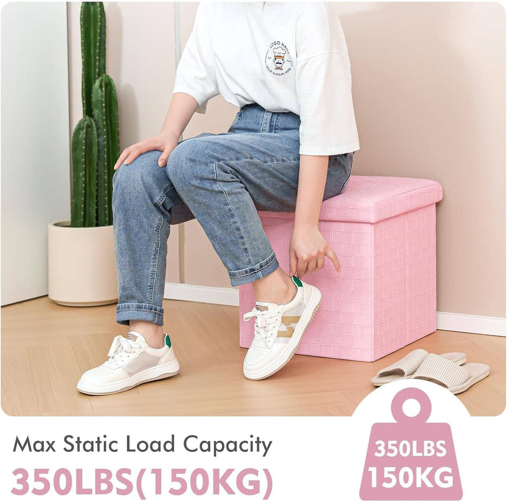 Pink faux leather storage ottoman footrest used as seating, person standing beside.