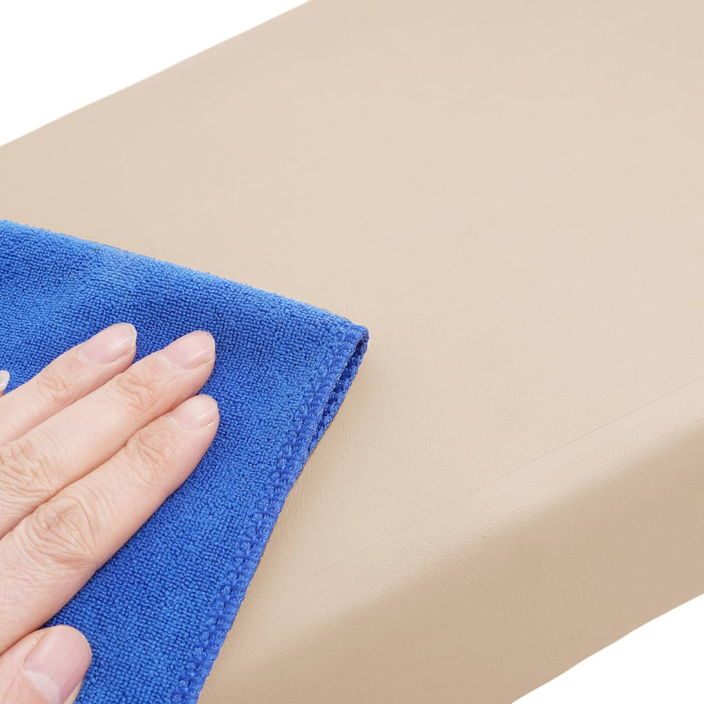 Beige cushion surface with fine-grain texture and subtle crease lines