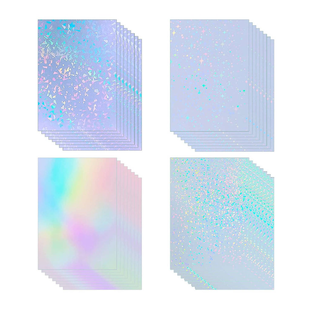 Stack of holographic clear vinyl sticker sheets with iridescent sparkle