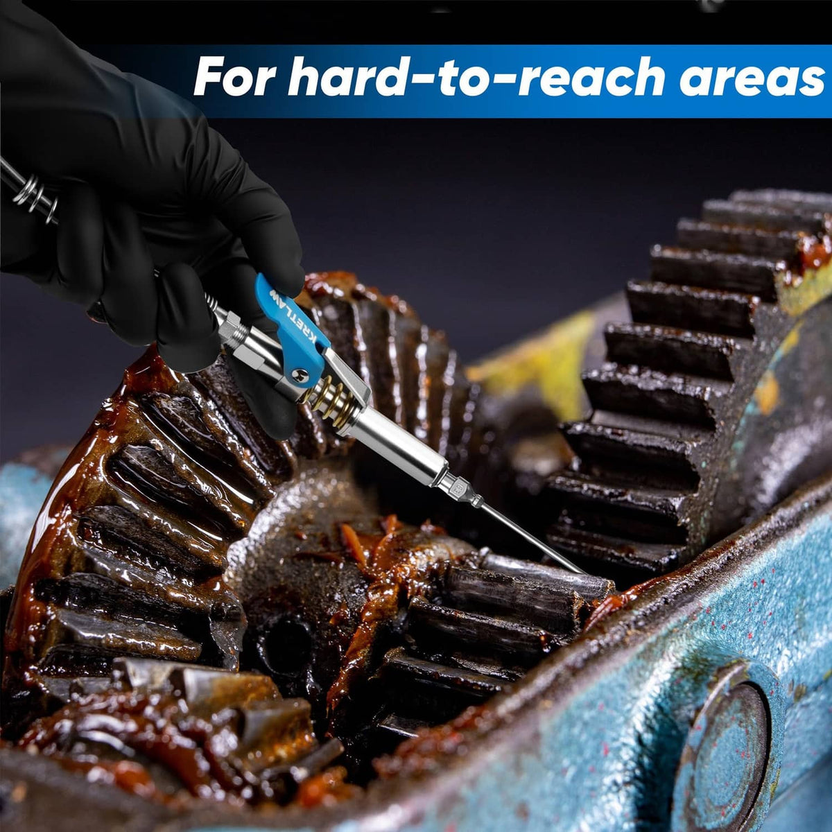 Grease gun applying lubricant to tight spaces with blue nozzle and black gloves