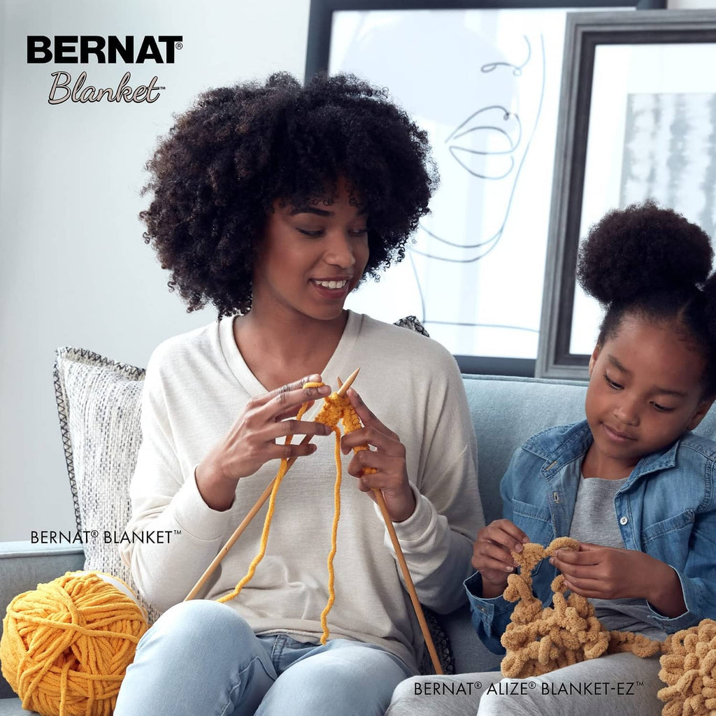 Children holding chunky yarn and crocheting with a Bernat Blanket yarn ball