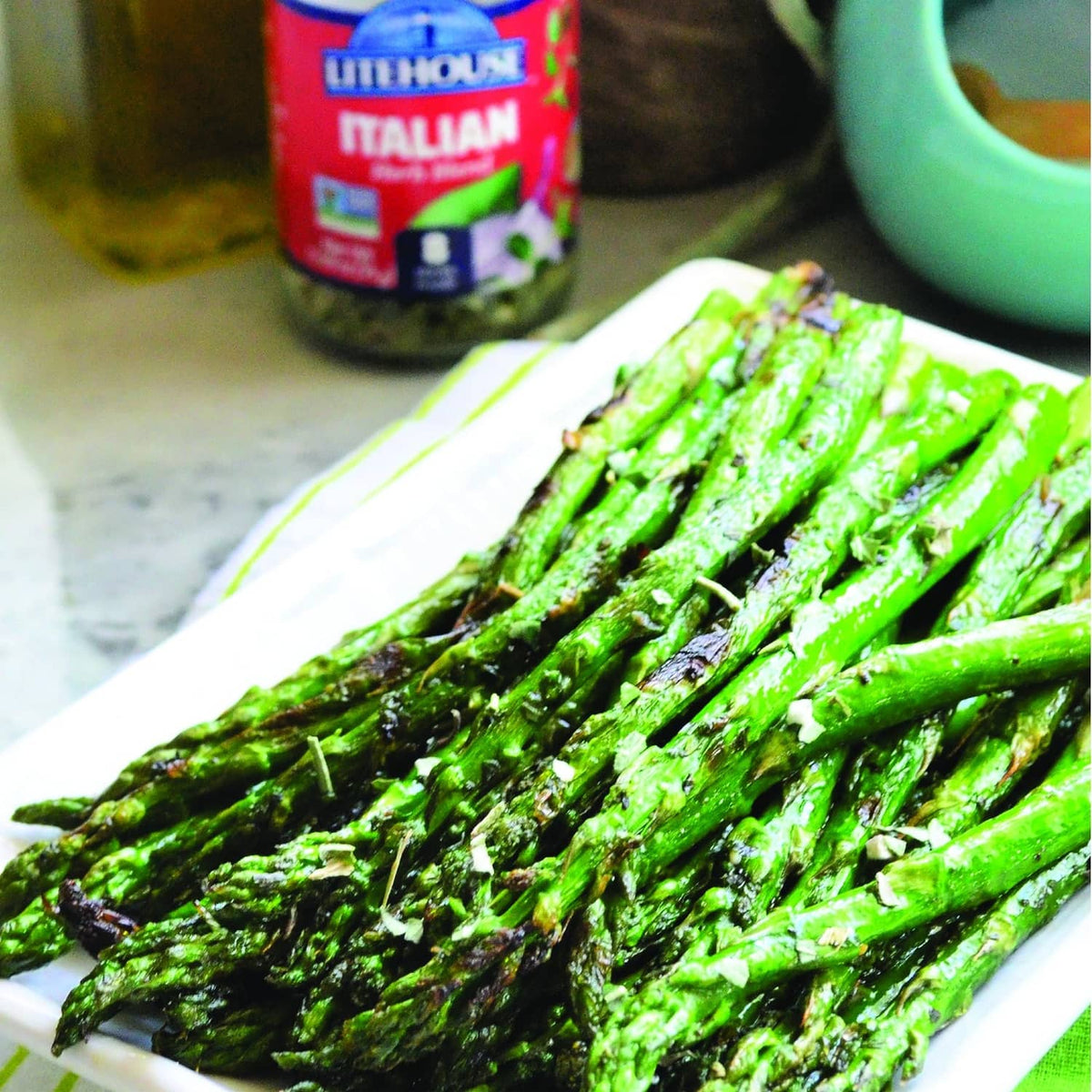 Roasted green asparagus with Italian herb blend topping