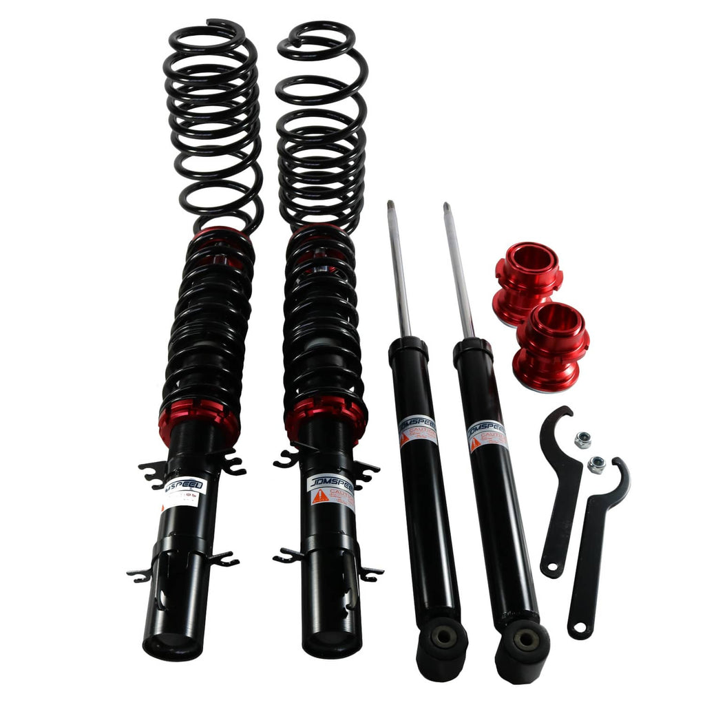 Black coilover shocks with red adjuster rings and coil springs, with mounting hardware