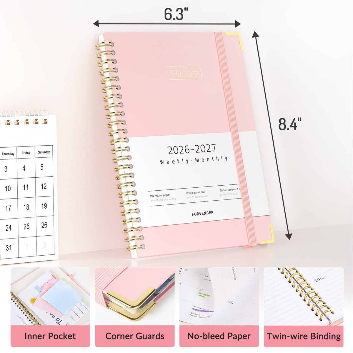 Pink weekly monthly planner with spiral binding, 2026–2027 date range, size markers.