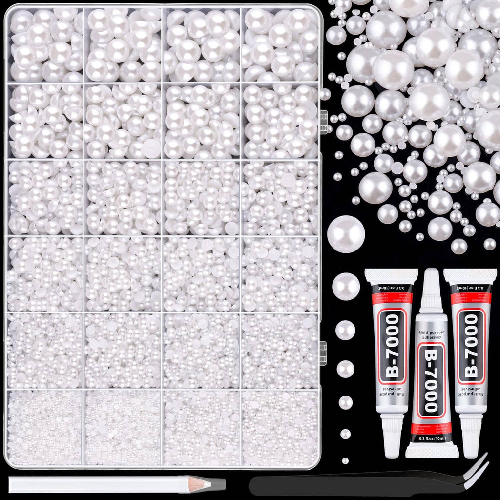 Divided clear tray of white flatback pearls in assorted sizes, visible bead detail