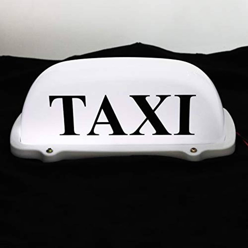 White illuminated "TAXI" roof light topper with red wires visible