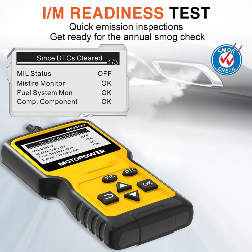 OBD2 scanner lying on side with screen showing emissions readiness menu