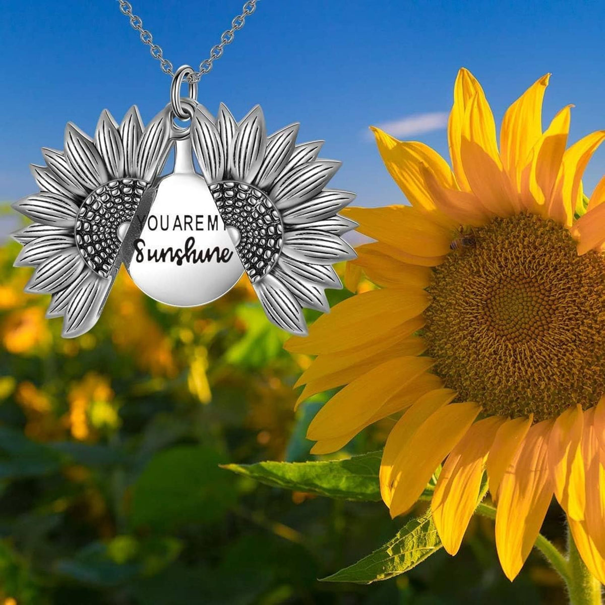 Sterling silver sunflower locket pendant necklace with engraved "You Are My Sunshine" front