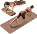 Foldable extra-thick yoga mat, taupe/brown color, non-slip surface for floor exercises