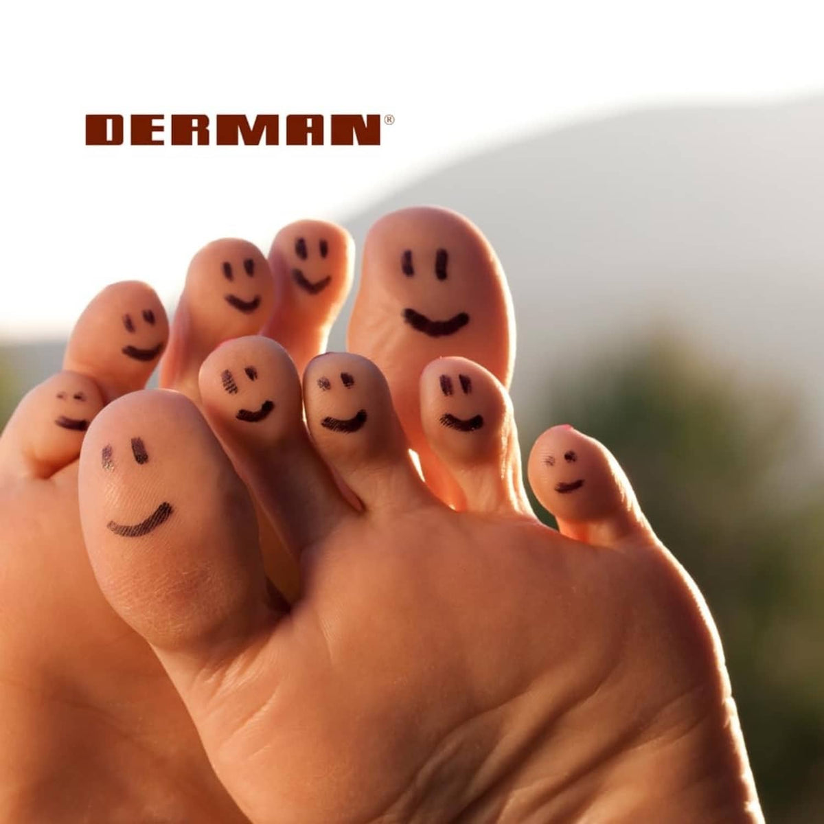 Bare toes with smiling face stickers, indicating comfort for athlete's foot relief.