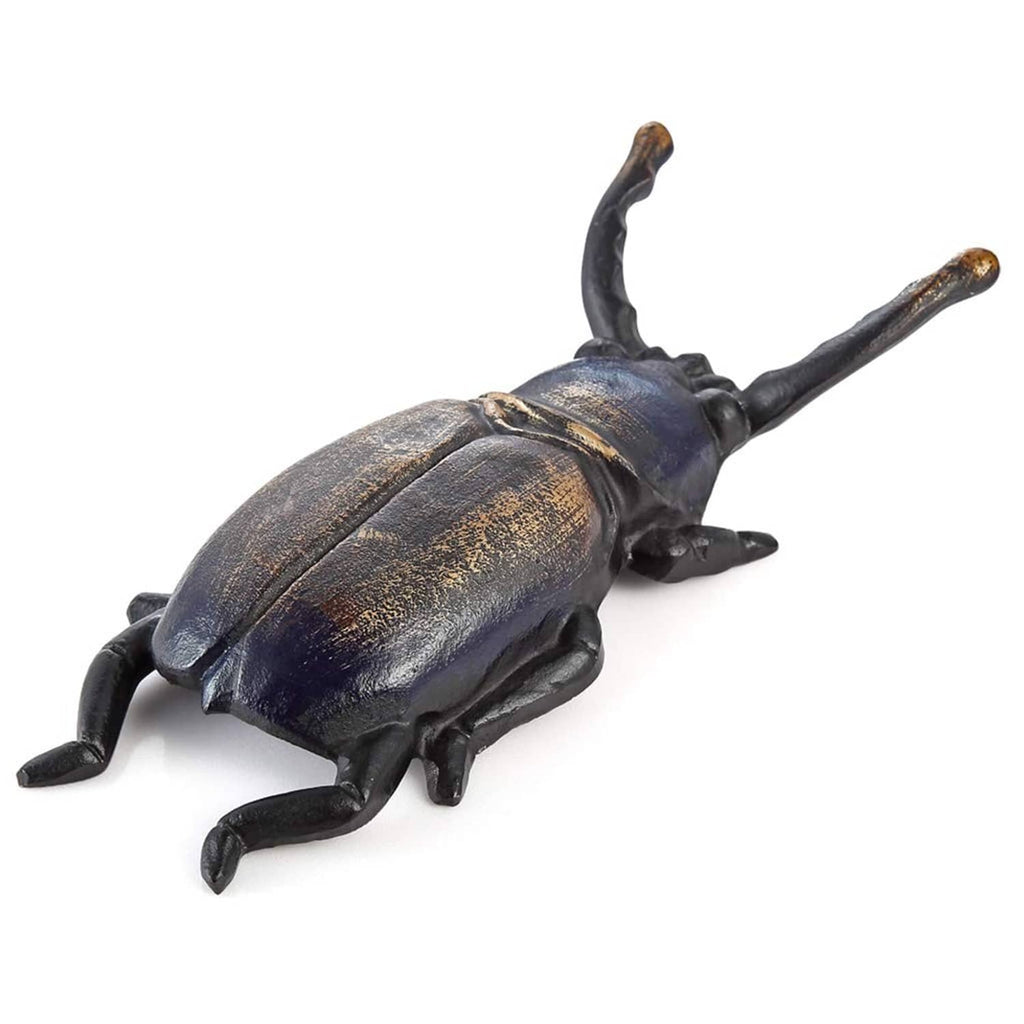 Bronze-toned cast iron beetle boot jack with curved pull handle and claw feet