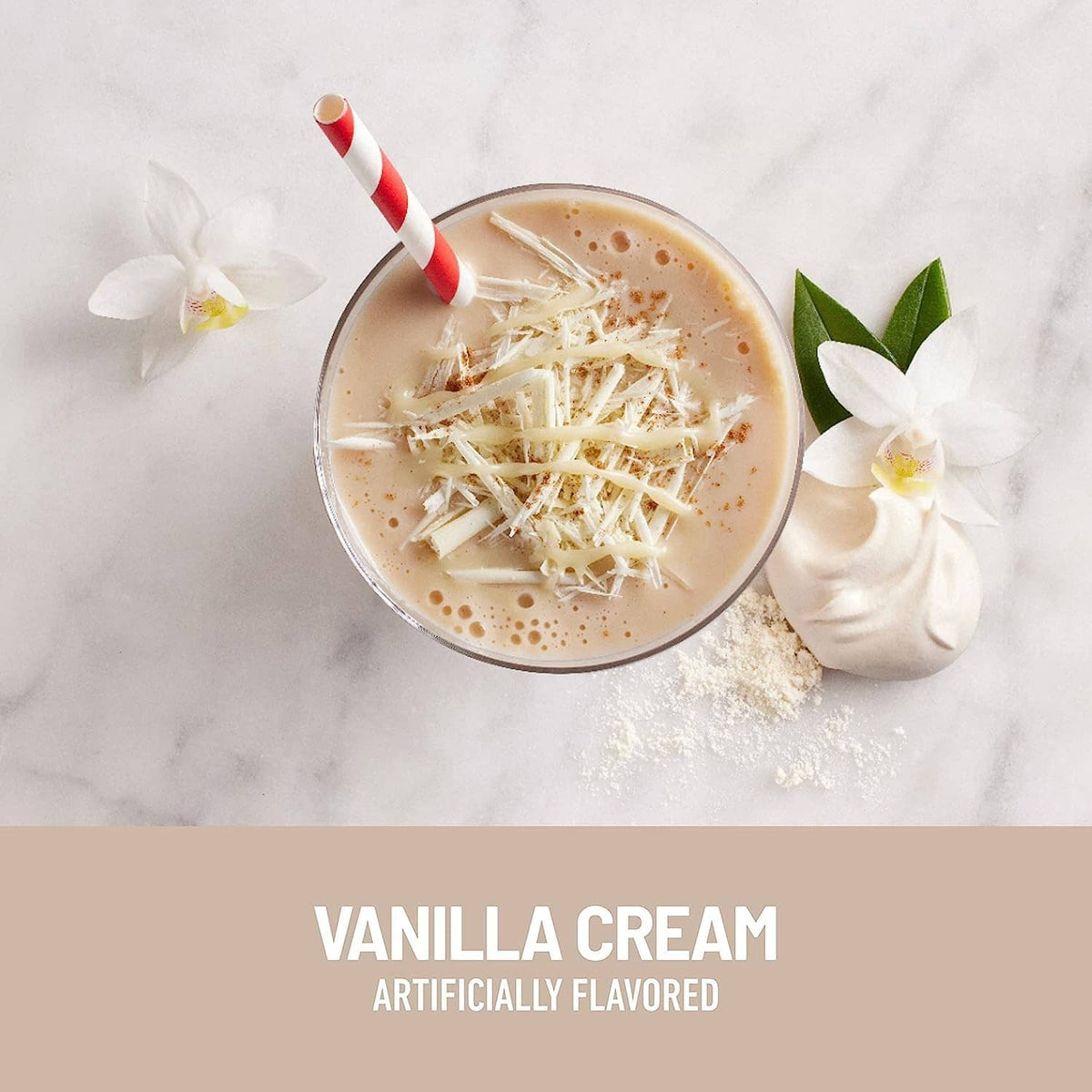 Vanilla cream high-protein shake in a bowl with whipped cream and vanilla garnish