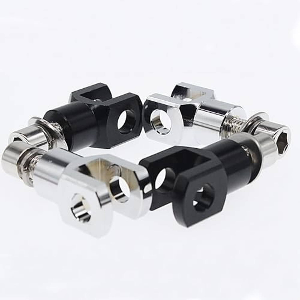 Black and silver motorcycle footrest mount supports with bolts and washer plates
