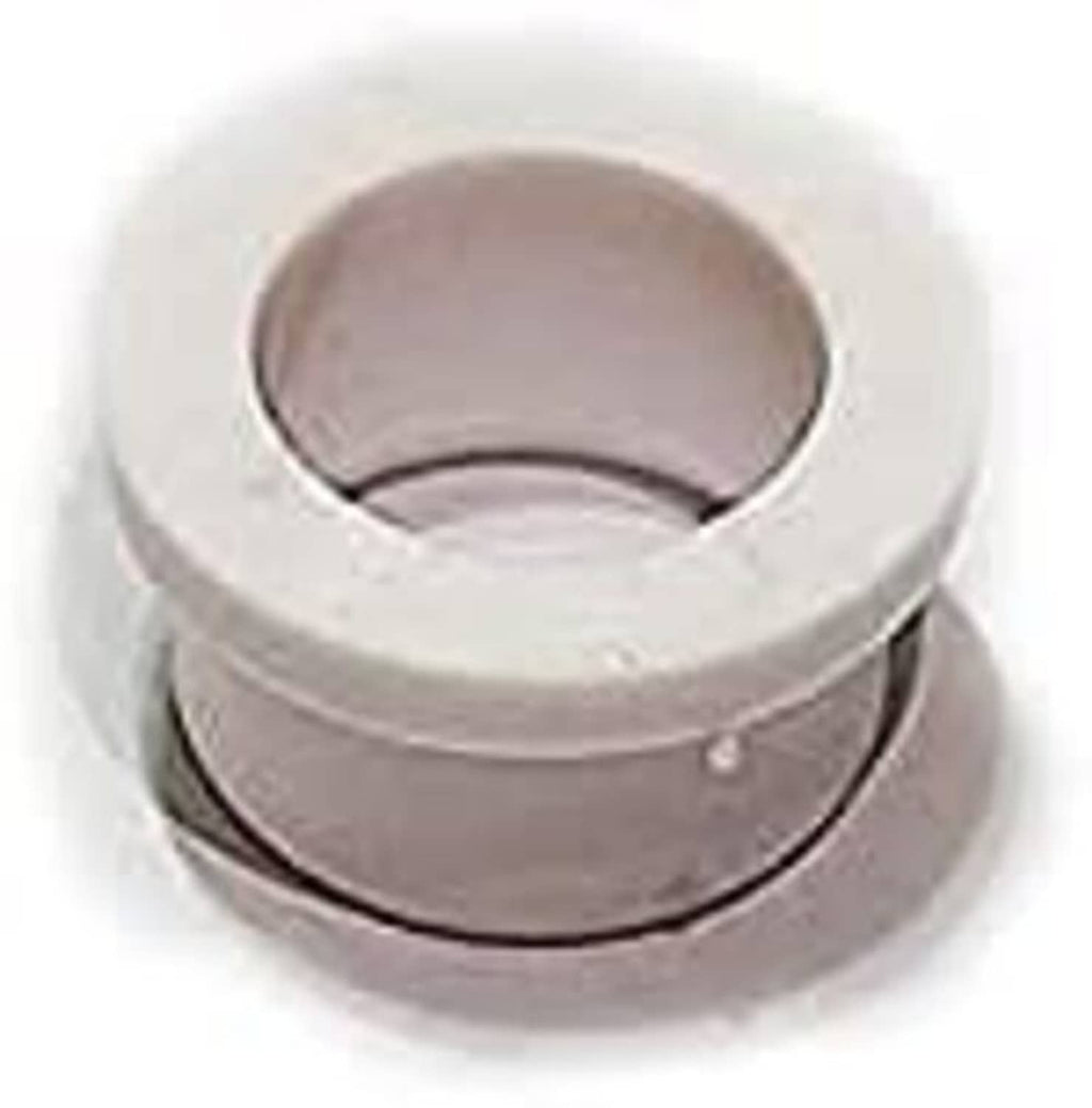 Top view of light gray rubber bushing with black inner ring