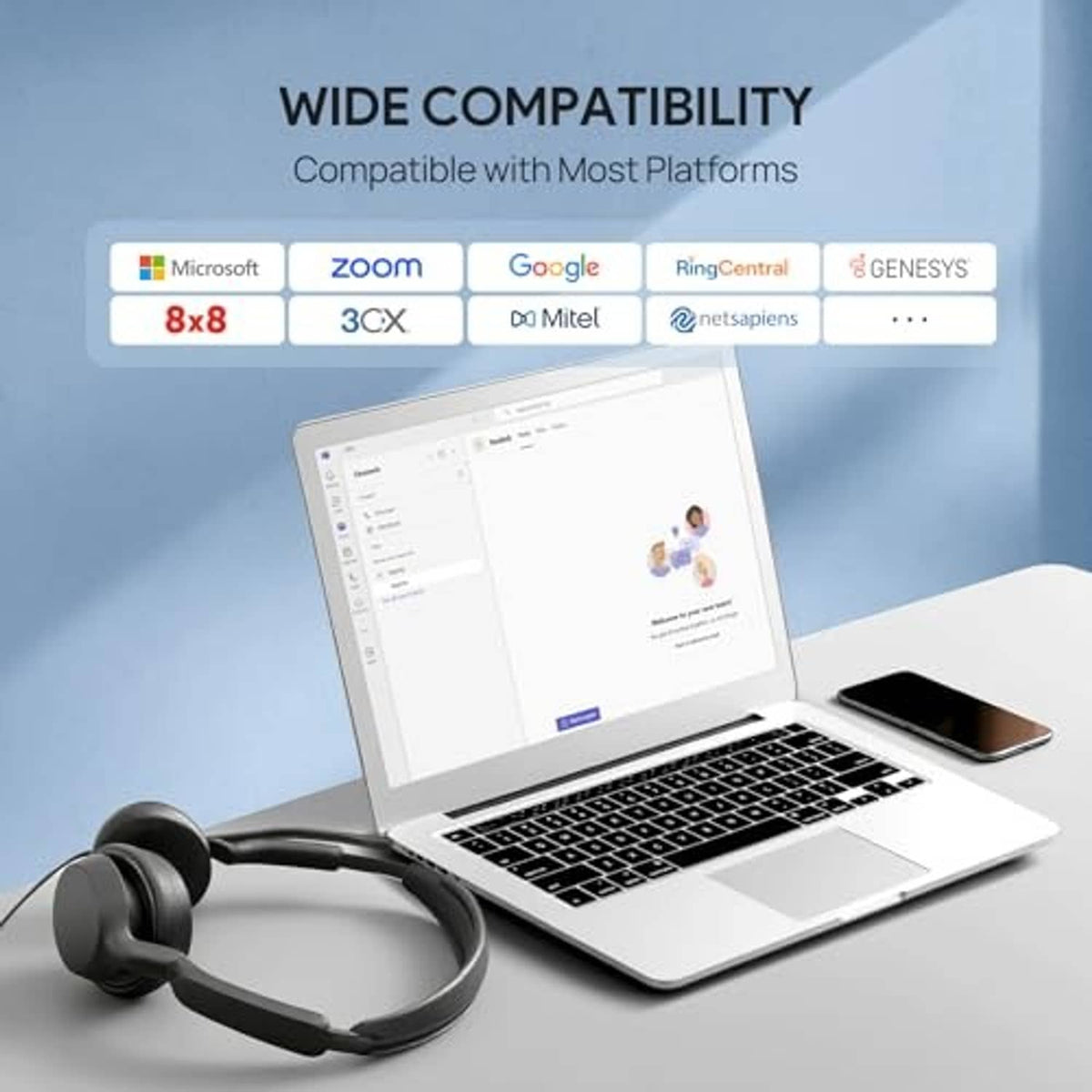 Black wired over-ear headset with boom mic placed near a laptop