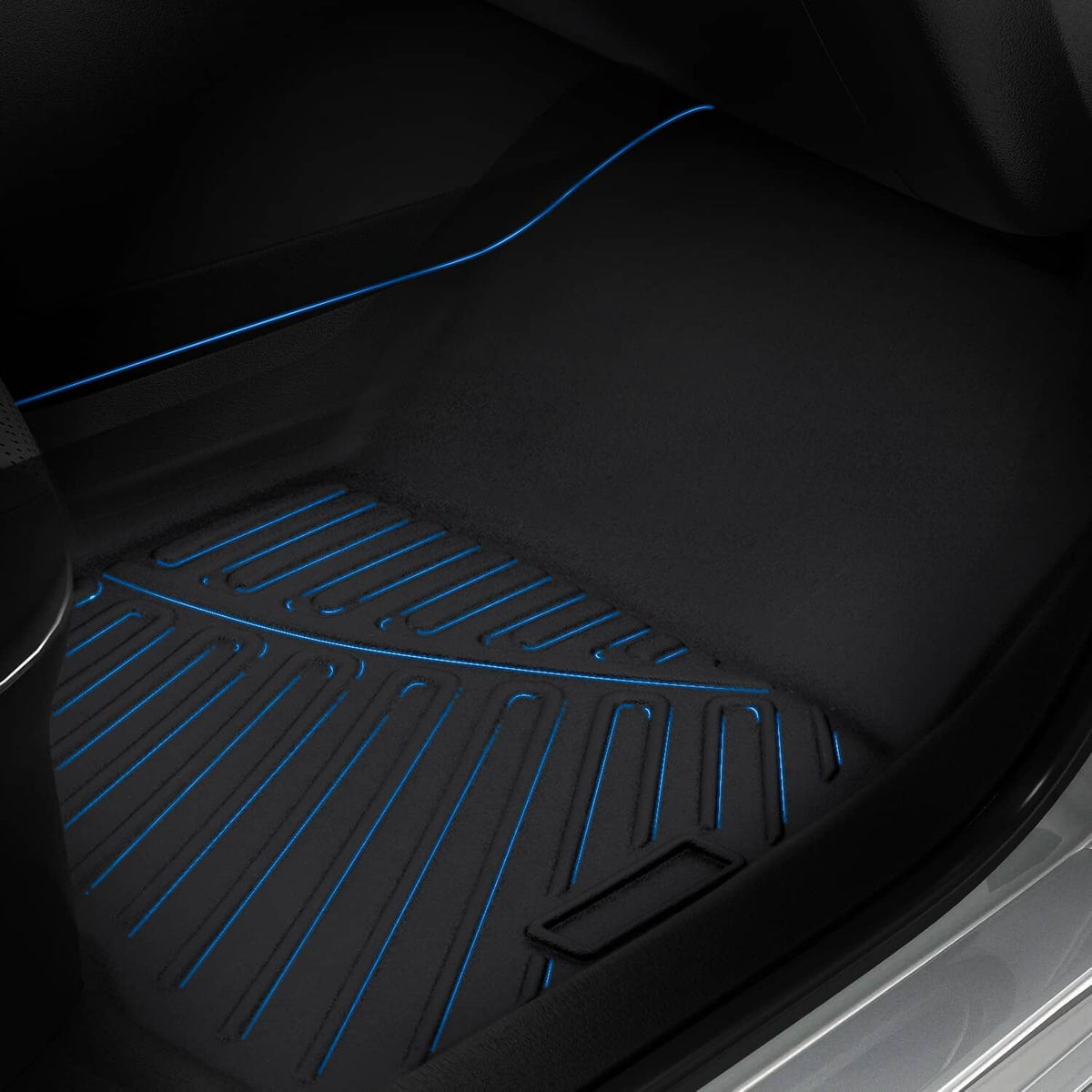 Black cargo liner with blue accent channels and raised anti-slip tread