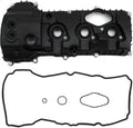 Left-side engine valve cover with oil ports and bolt holes; includes gasket